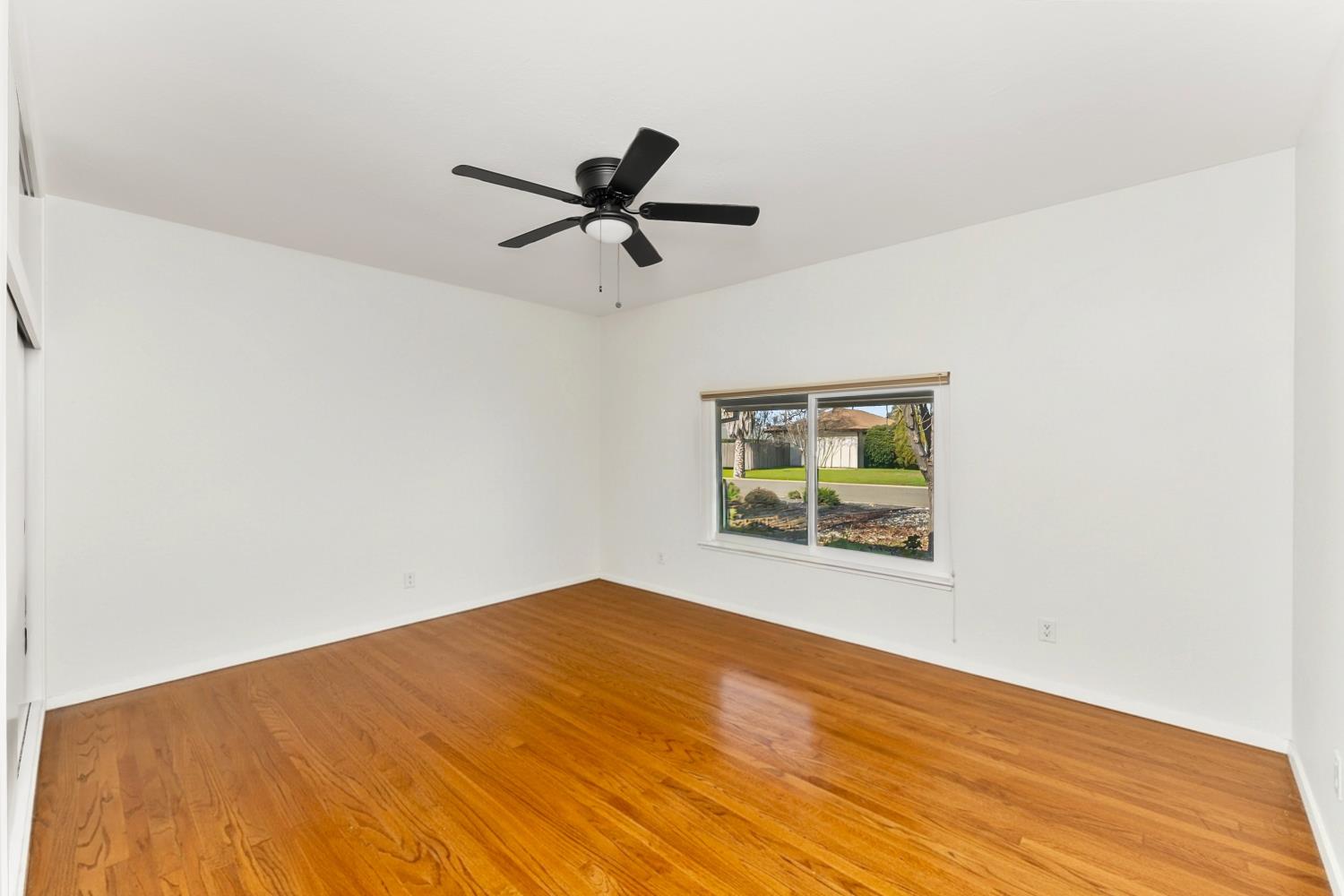 3620 Sean Drive Sacramento, CA 95821 - Photo 19 of 23 a view of empty room with wooden floor and fan