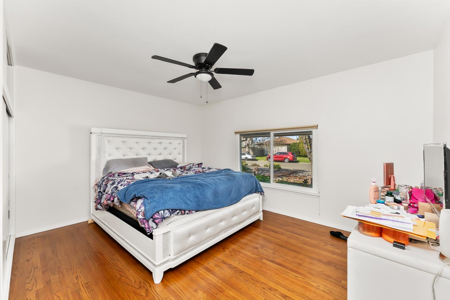 3620 Sean Drive Sacramento, CA 95821 - Photo 20 of 23 a bedroom with a bed and a table in it