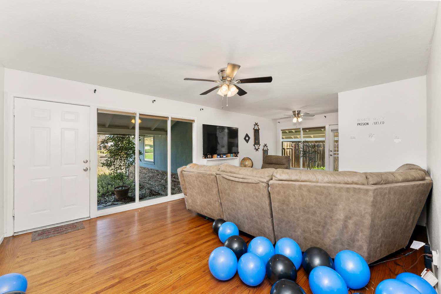 3620 Sean Drive Sacramento, CA 95821 - Photo 3 of 23 a living room with furniture and floor to ceiling window and kitchen
