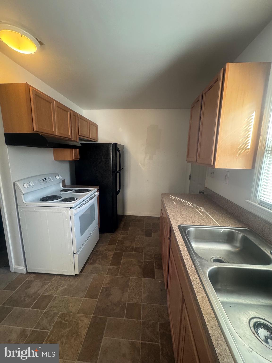 11370 Ridge Road King George, VA 22485 - Photo 8 of 17 a kitchen that has a sink and a stove