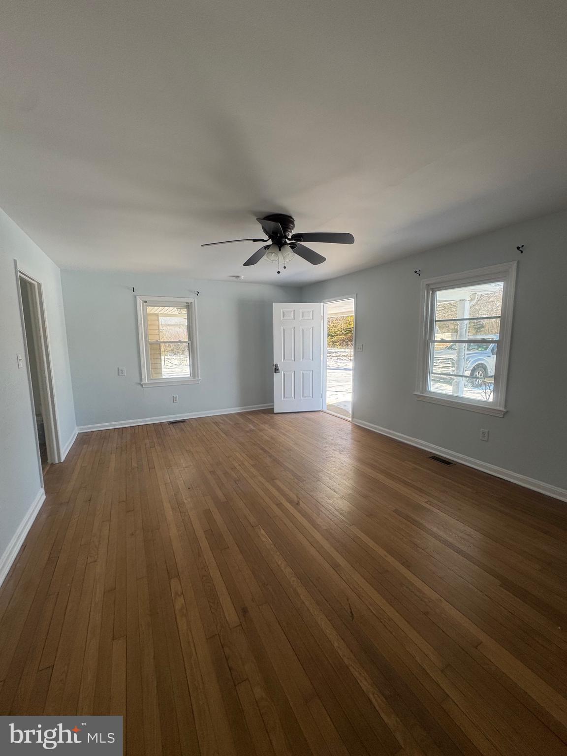 11370 Ridge Road King George, VA 22485 - Photo 10 of 17 a view of an empty room with wooden floor and a window