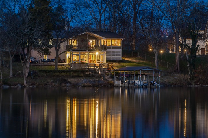 812 Burton Point Road Mount Juliet, TN 37122 - Photo 13 of 29 a view of a house with a small yard next to a lake