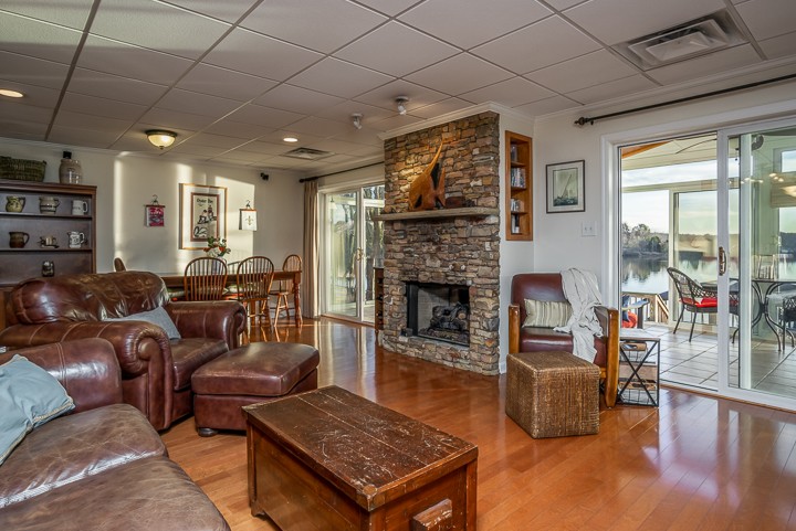 812 Burton Point Road Mount Juliet, TN 37122 - Photo 14 of 29 a living room with furniture and a fireplace