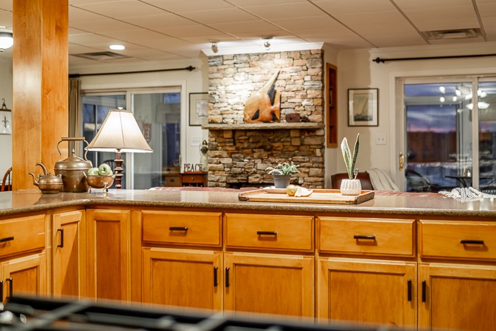 812 Burton Point Road Mount Juliet, TN 37122 - Photo 16 of 29 a kitchen with a sink and a large mirror next to a window