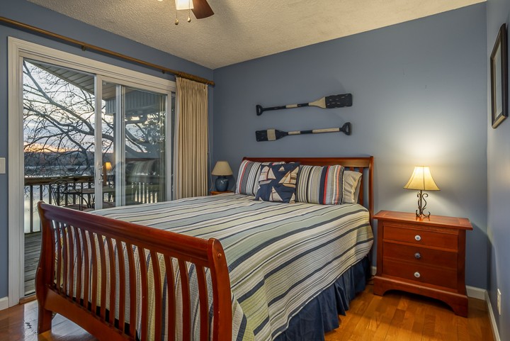 812 Burton Point Road Mount Juliet, TN 37122 - Photo 21 of 29 a bedroom with a bed and a window