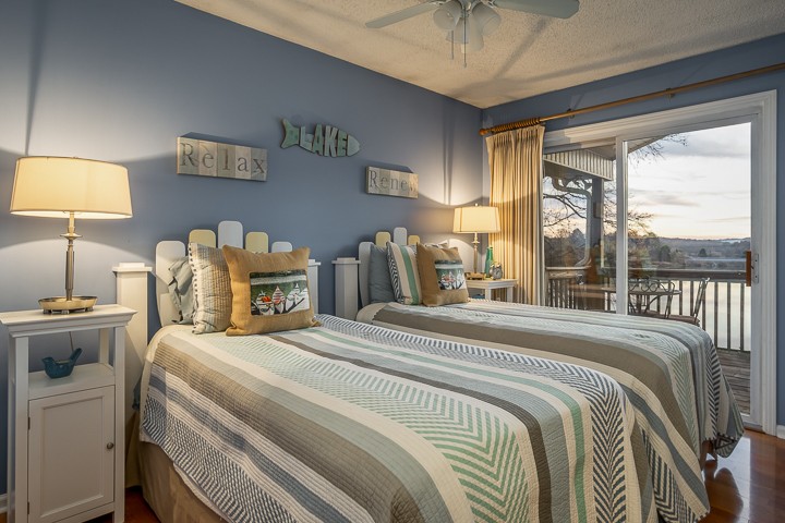 812 Burton Point Road Mount Juliet, TN 37122 - Photo 22 of 29 a bedroom with a bed and a night stand