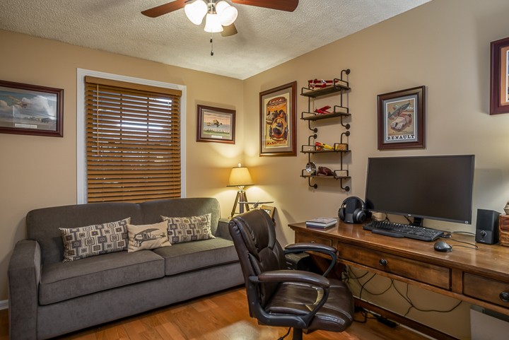 812 Burton Point Road Mount Juliet, TN 37122 - Photo 23 of 29 a living room with furniture and a flat screen tv