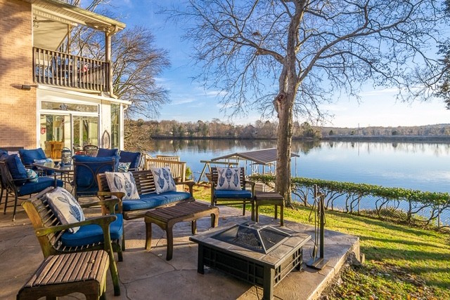 812 Burton Point Road Mount Juliet, TN 37122 - Photo 3 of 29 a view of a swimming pool with couches and lounge chairs