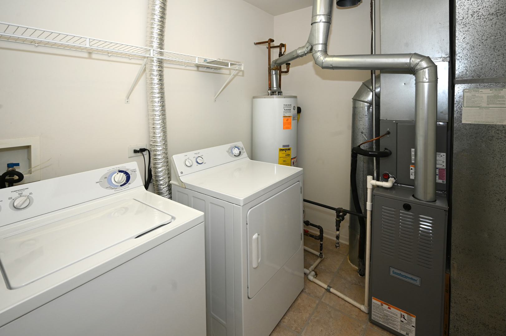573 Telluride Drive Gilberts, IL 60136 - Photo 14 of 24 a utility room with dryer and washer