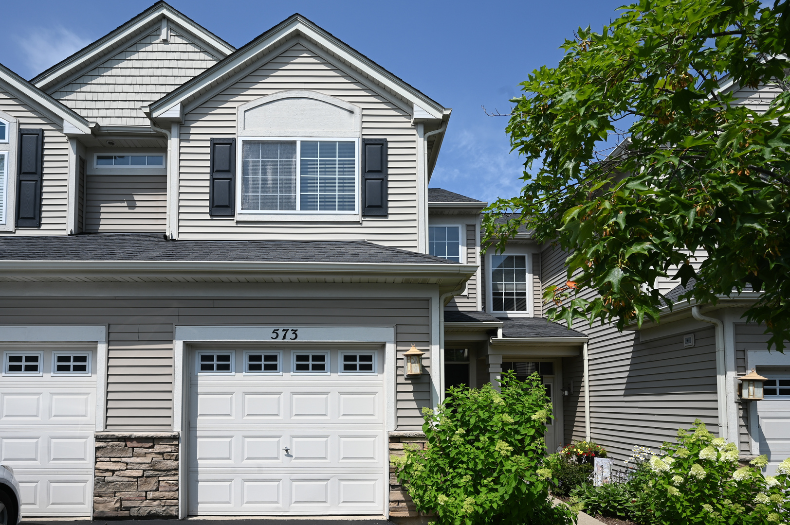 573 Telluride Drive Gilberts, IL 60136 - Photo 2 of 24 a front view of a house with a yard
