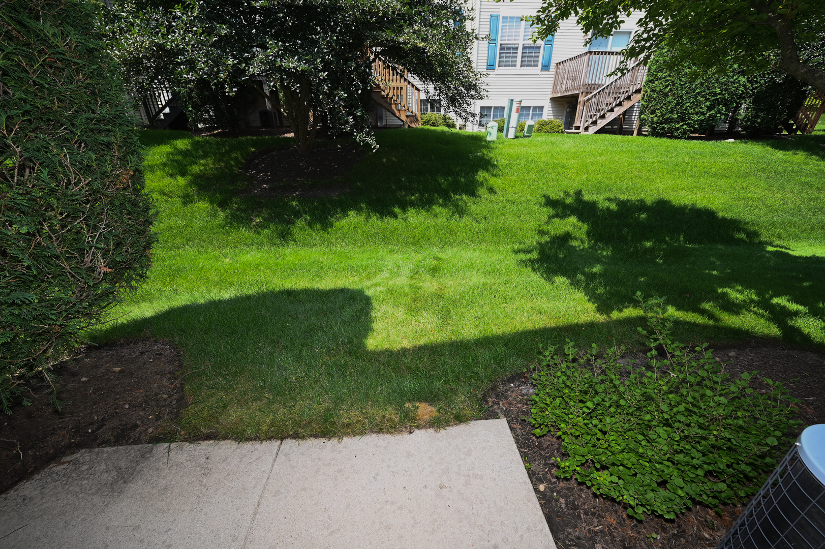 573 Telluride Drive Gilberts, IL 60136 - Photo 24 of 24 a view of a garden with a building in the background