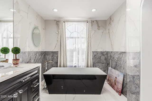 a bedroom with a bed and furniture