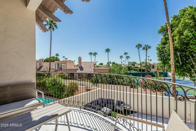 a view of hallway with wooden floor