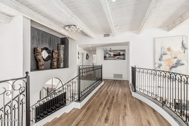 a view of a swimming pool with a lounge chair