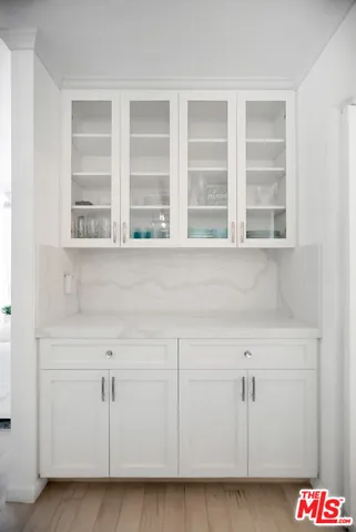 a view of balcony with small garden