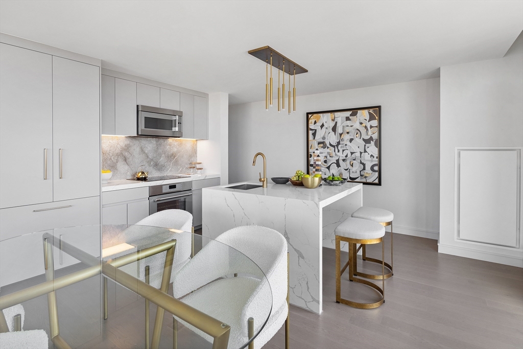 55 Lagrange Street, Unit 1804 Boston, MA 02116 - Photo 10 of 28 a living room with furniture