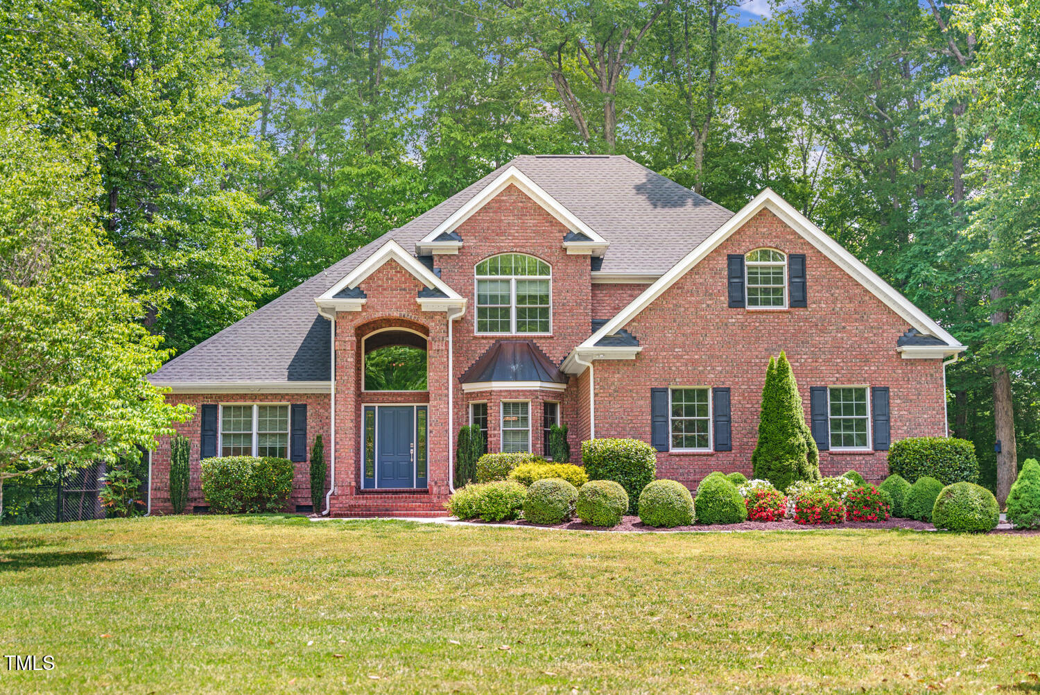 412 Bowen Road Rougemont, NC 27572 - Photo 1 of 40 a front view of a house with a yard and garage