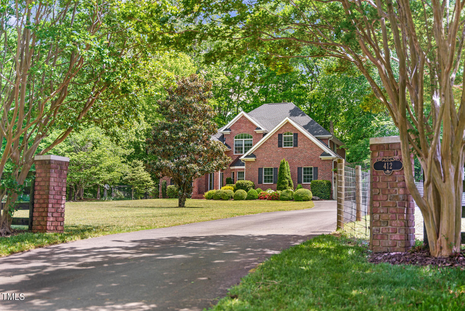 412 Bowen Road Rougemont, NC 27572 - Photo 3 of 40 a front view of a house with a yard and trees