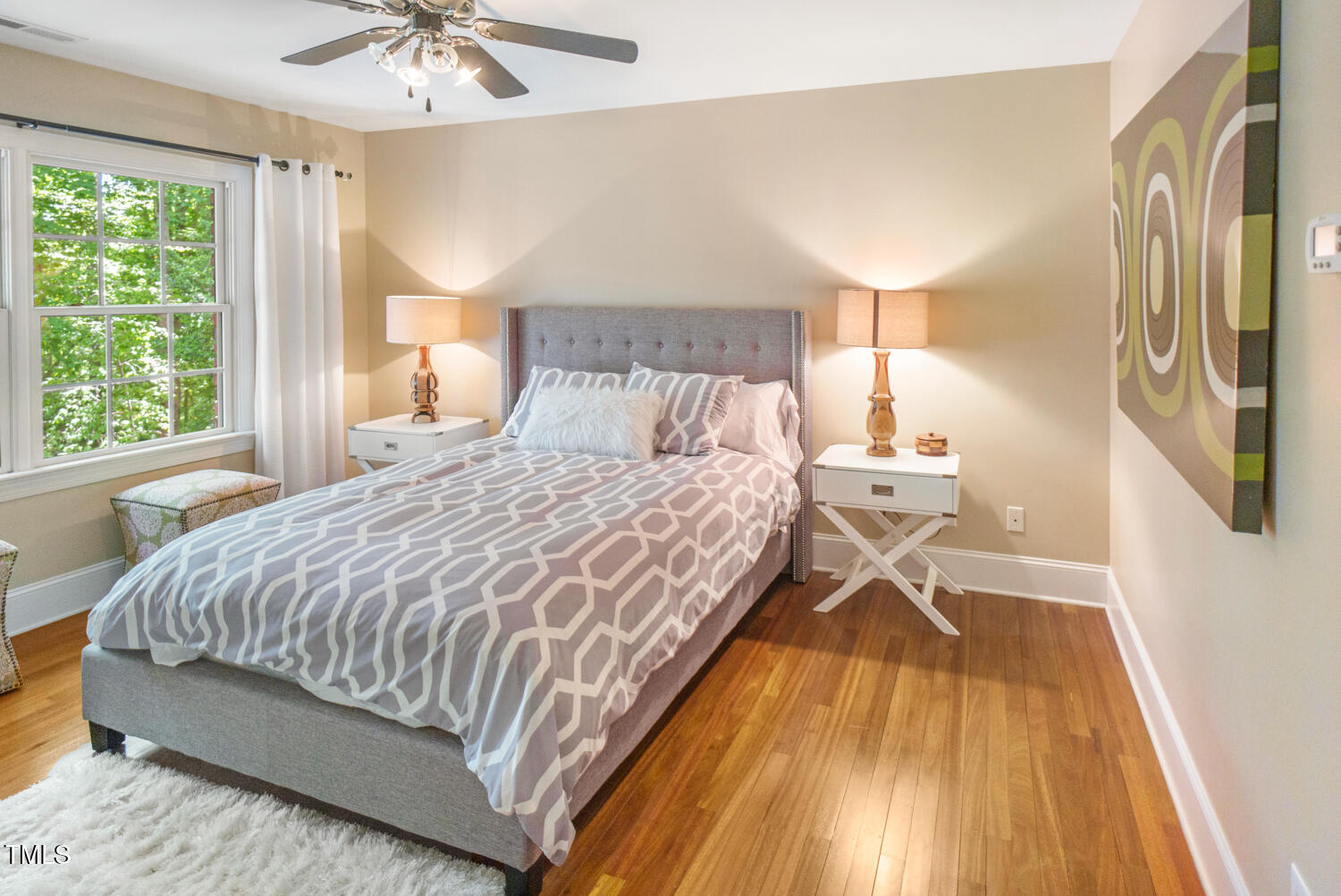 412 Bowen Road Rougemont, NC 27572 - Photo 37 of 40 a bedroom with a bed and a chandelier