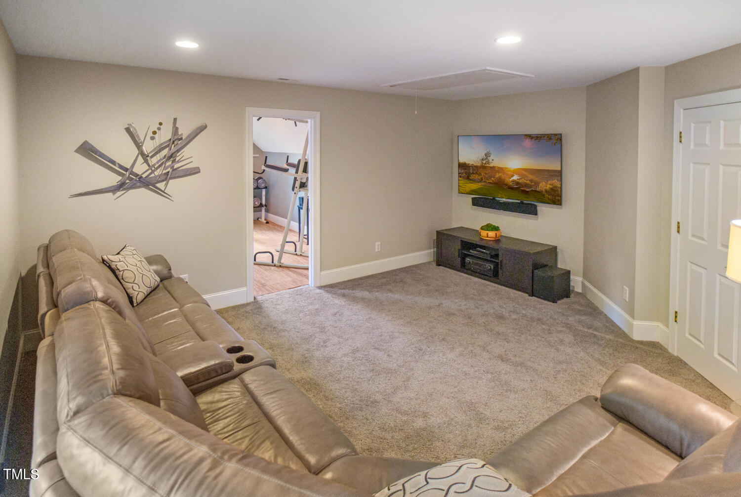 412 Bowen Road Rougemont, NC 27572 - Photo 38 of 40 a living room with furniture and a flat screen tv