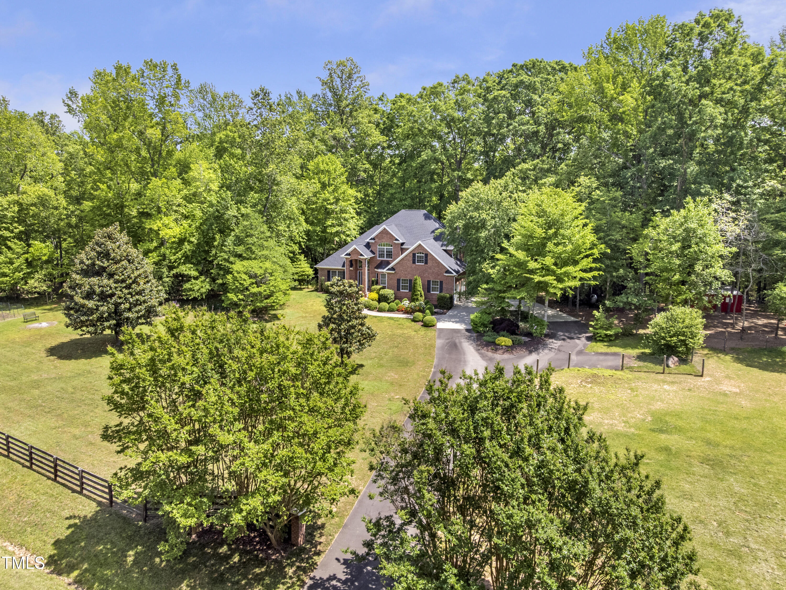 412 Bowen Road Rougemont, NC 27572 - Photo 4 of 40 a aerial view of a house with swimming pool and sitting area