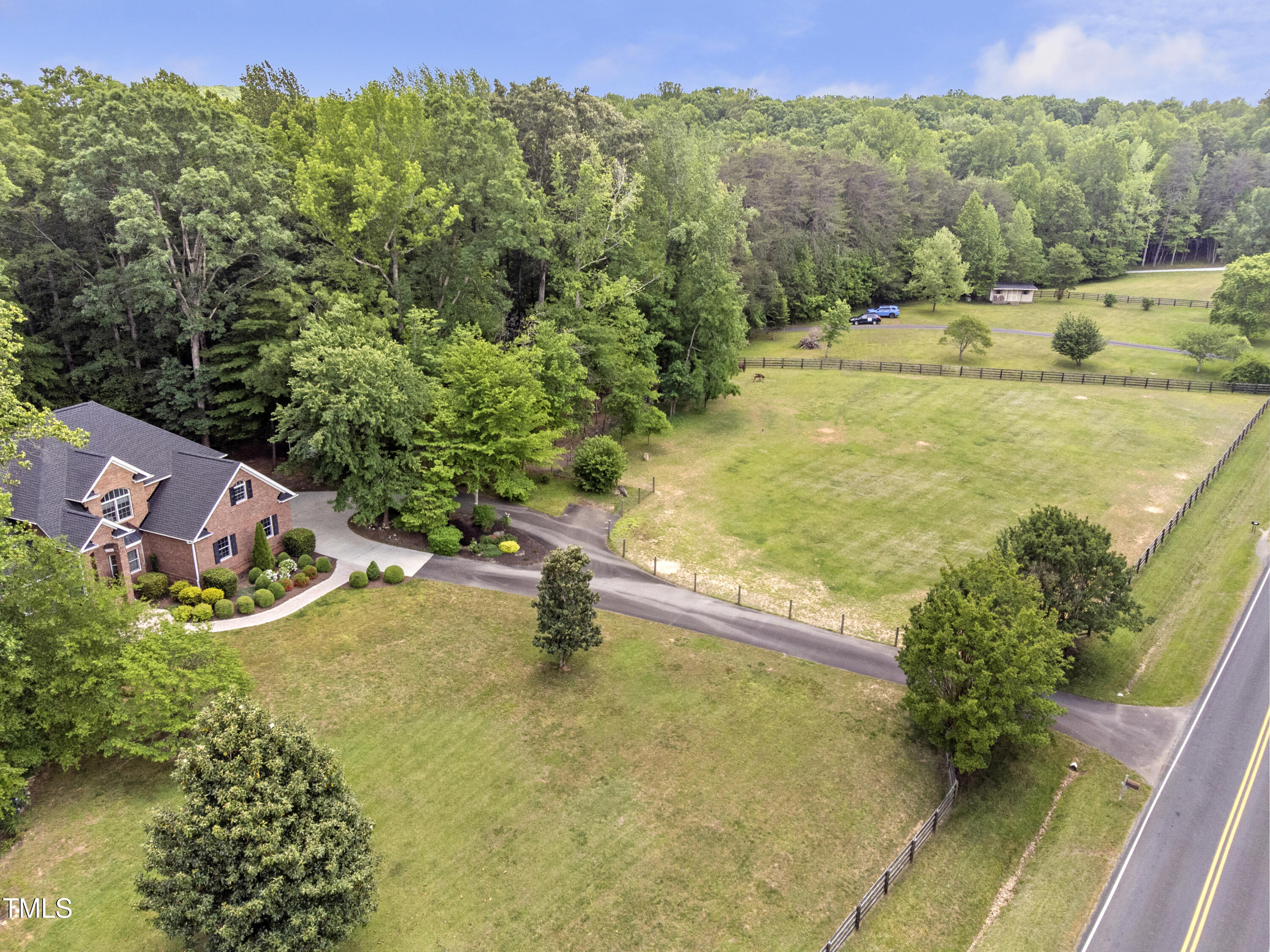 412 Bowen Road Rougemont, NC 27572 - Photo 5 of 40 a view of a swimming pool with a yard
