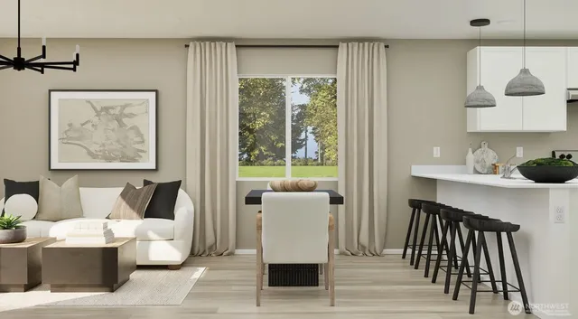 a living room with furniture and a lamp