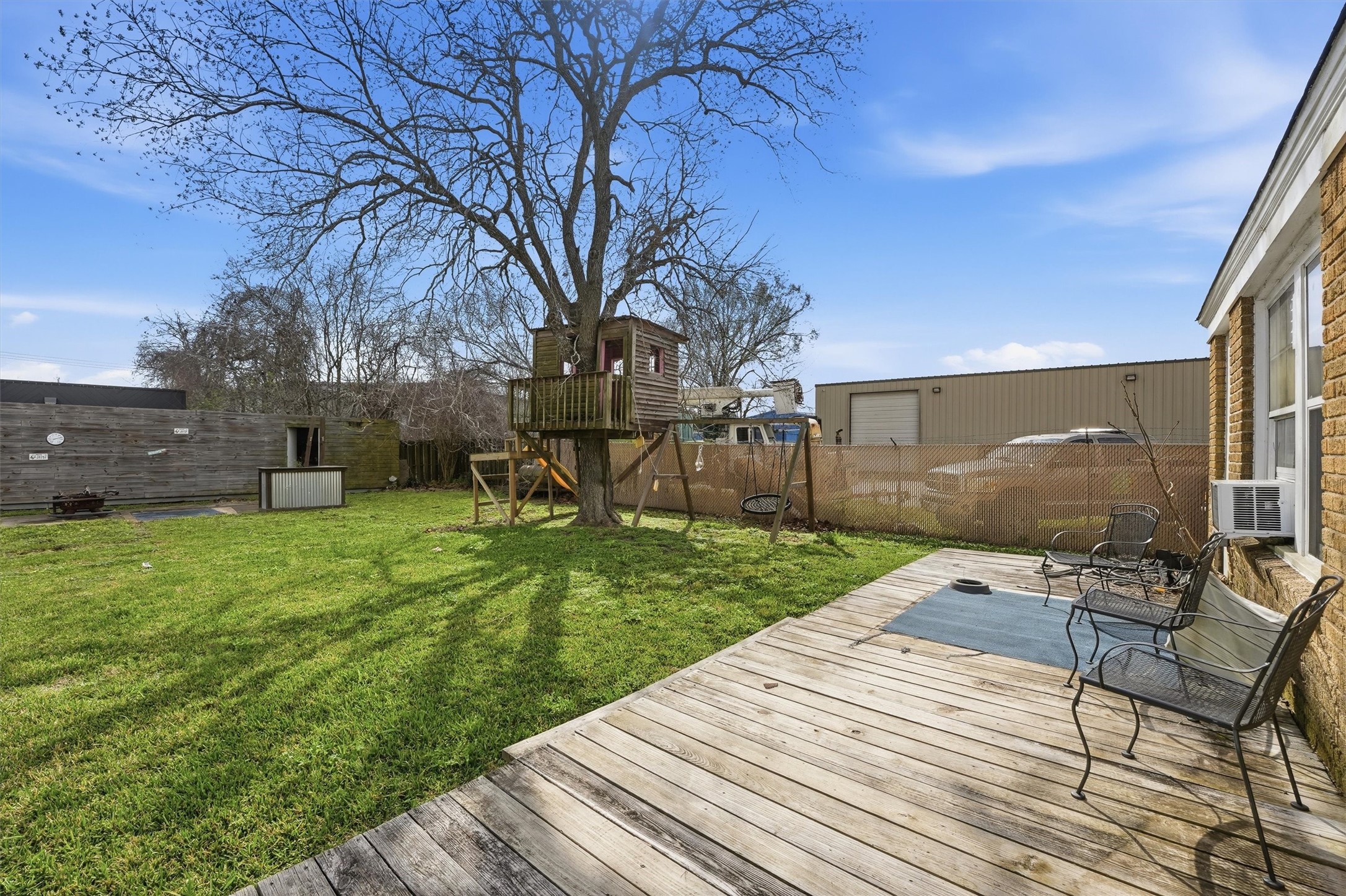 403 South Velasco Street Angleton, TX 77515 - Photo 24 of 25 a view of a backyard with sitting area