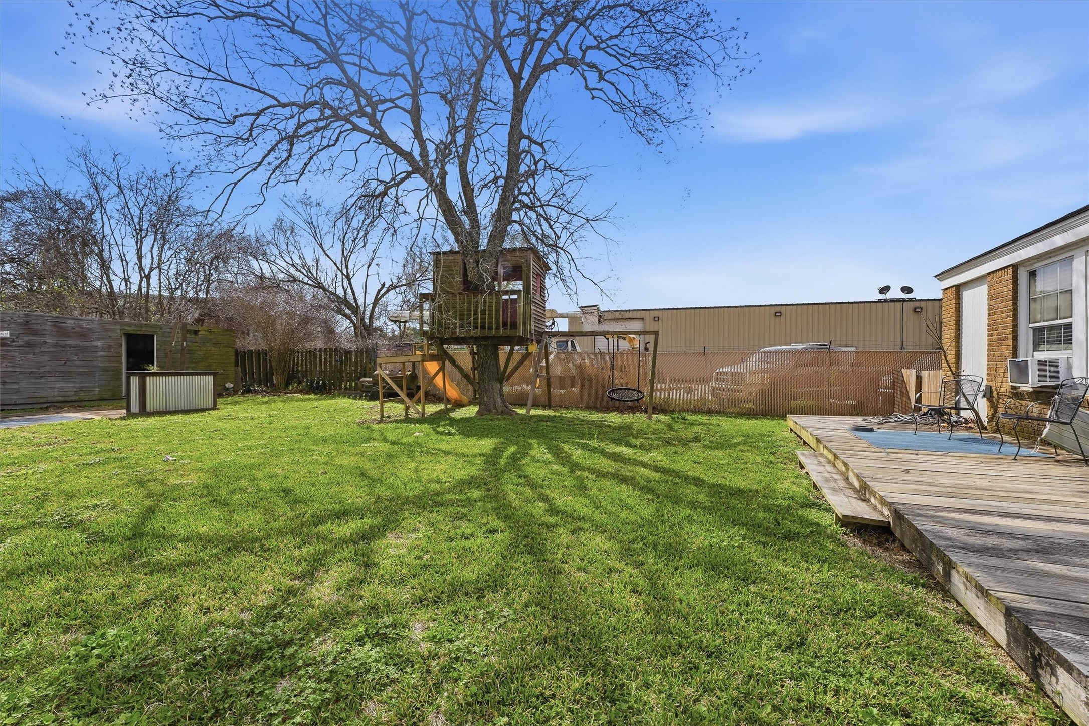 403 South Velasco Street Angleton, TX 77515 - Photo 25 of 25 a view of a backyard with a garden