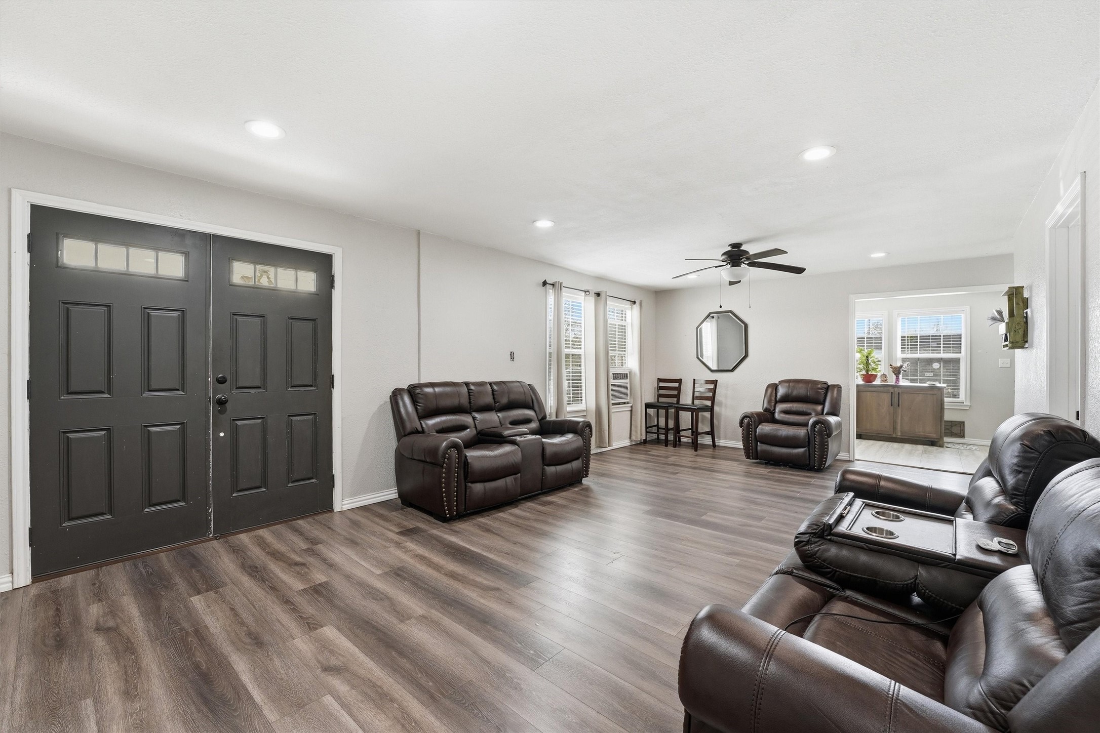 403 South Velasco Street Angleton, TX 77515 - Photo 4 of 25 a living room with furniture window and a wooden floor
