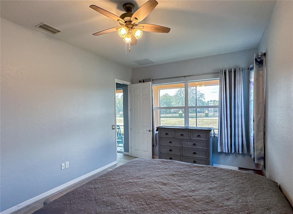 1124 Sawgrass Drive Winter Haven, FL 33859 - Photo 28 of 85 wooden floor in an empty room with a window