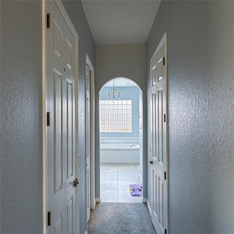 1124 Sawgrass Drive Winter Haven, FL 33859 - Photo 29 of 85 a view of a livingroom from a hallway