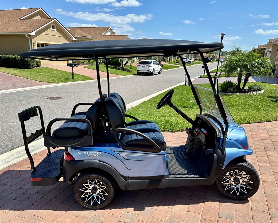 1124 Sawgrass Drive Winter Haven, FL 33859 - Photo 40 of 85 a view of a patio with table and chairs