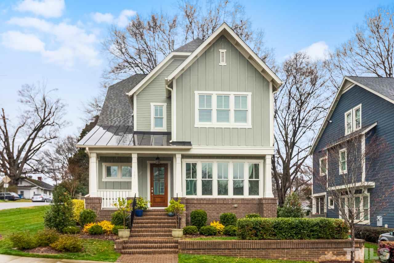 701 Virginia Avenue Raleigh, NC 27604 - Photo 1 of 16 a front view of a house with garden