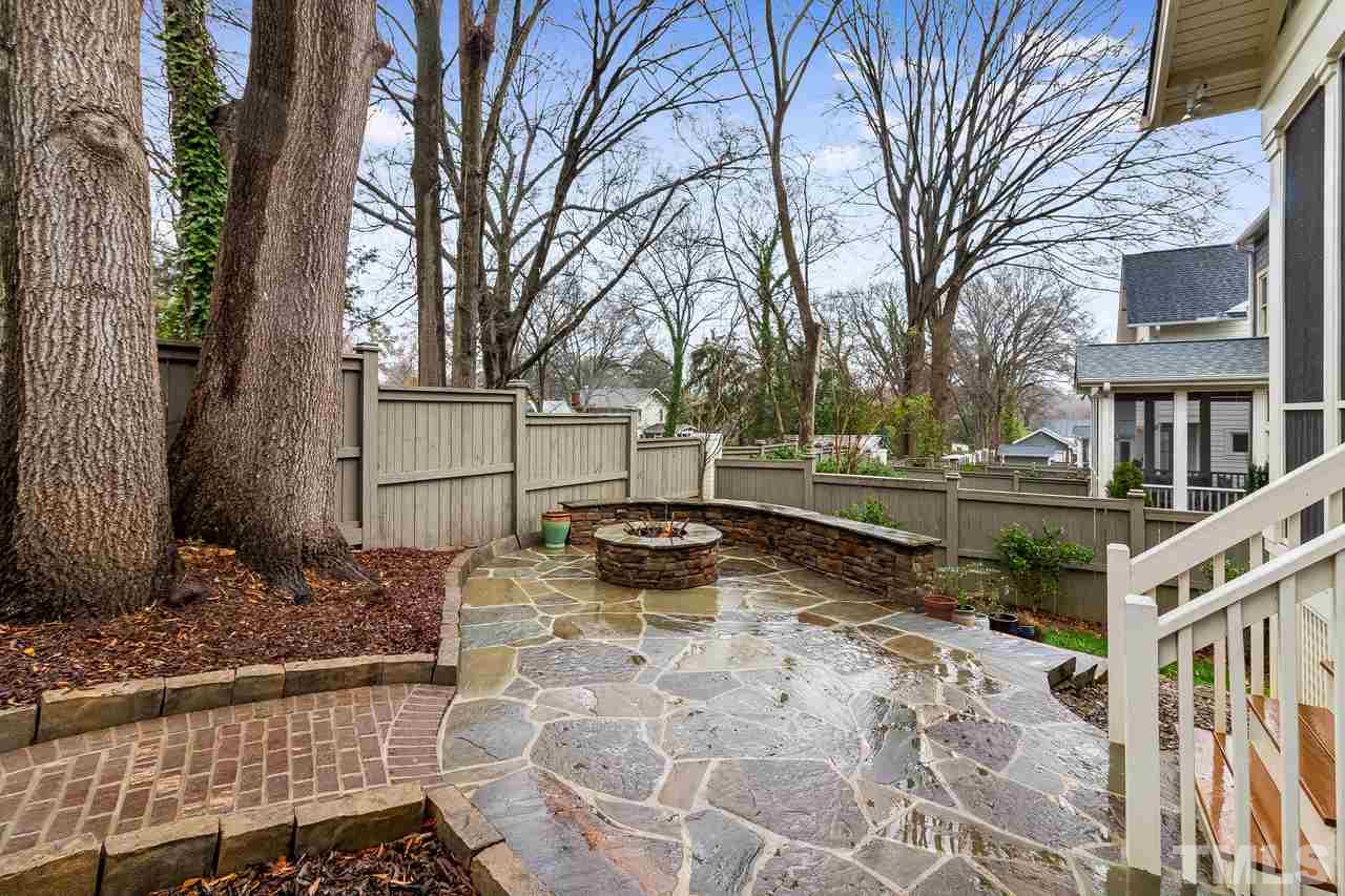 701 Virginia Avenue Raleigh, NC 27604 - Photo 15 of 16 a view of a yard with plants and trees