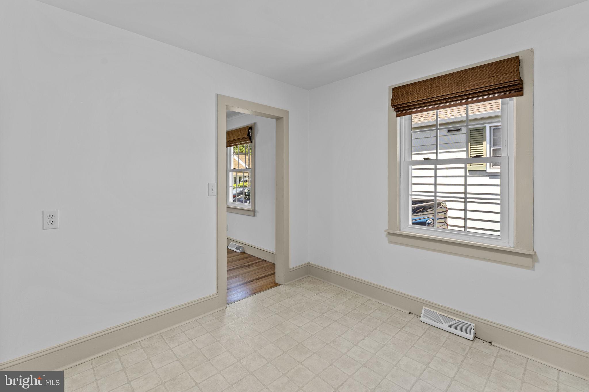 216 Walnut Street Berryville, VA 22611 - Photo 24 of 36 an empty room with a window