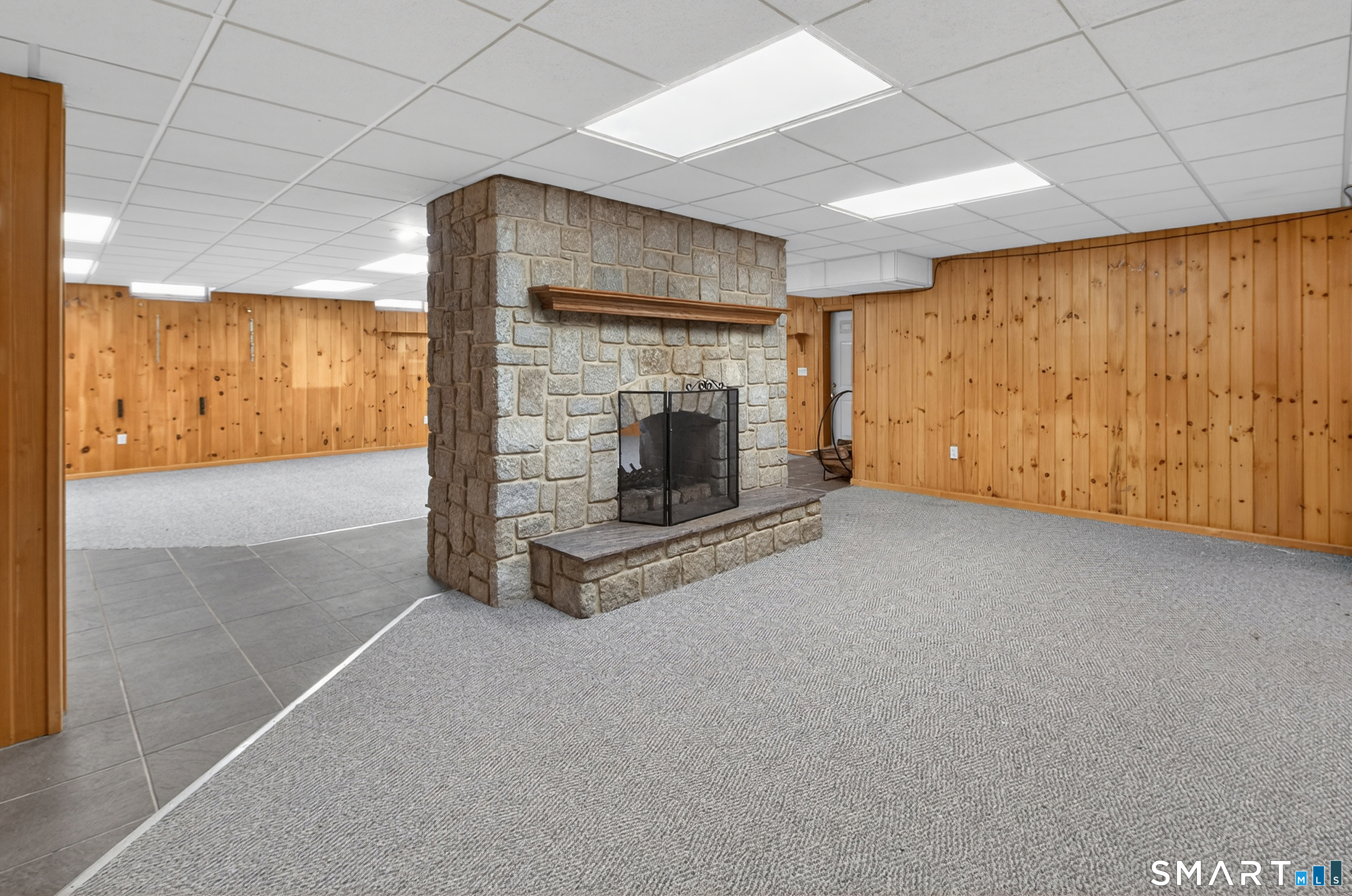 724 Strong Road South Windsor, CT 06074 - Photo 24 of 39 a view of an empty room with a fireplace