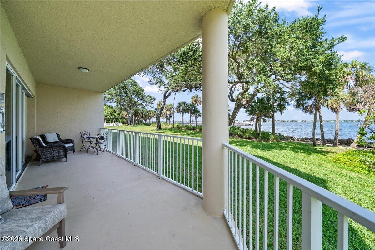 6005 Highway 1, Unit 101 Rockledge, FL 32955 - Photo 31 of 57 a view of a porch with furniture and garden