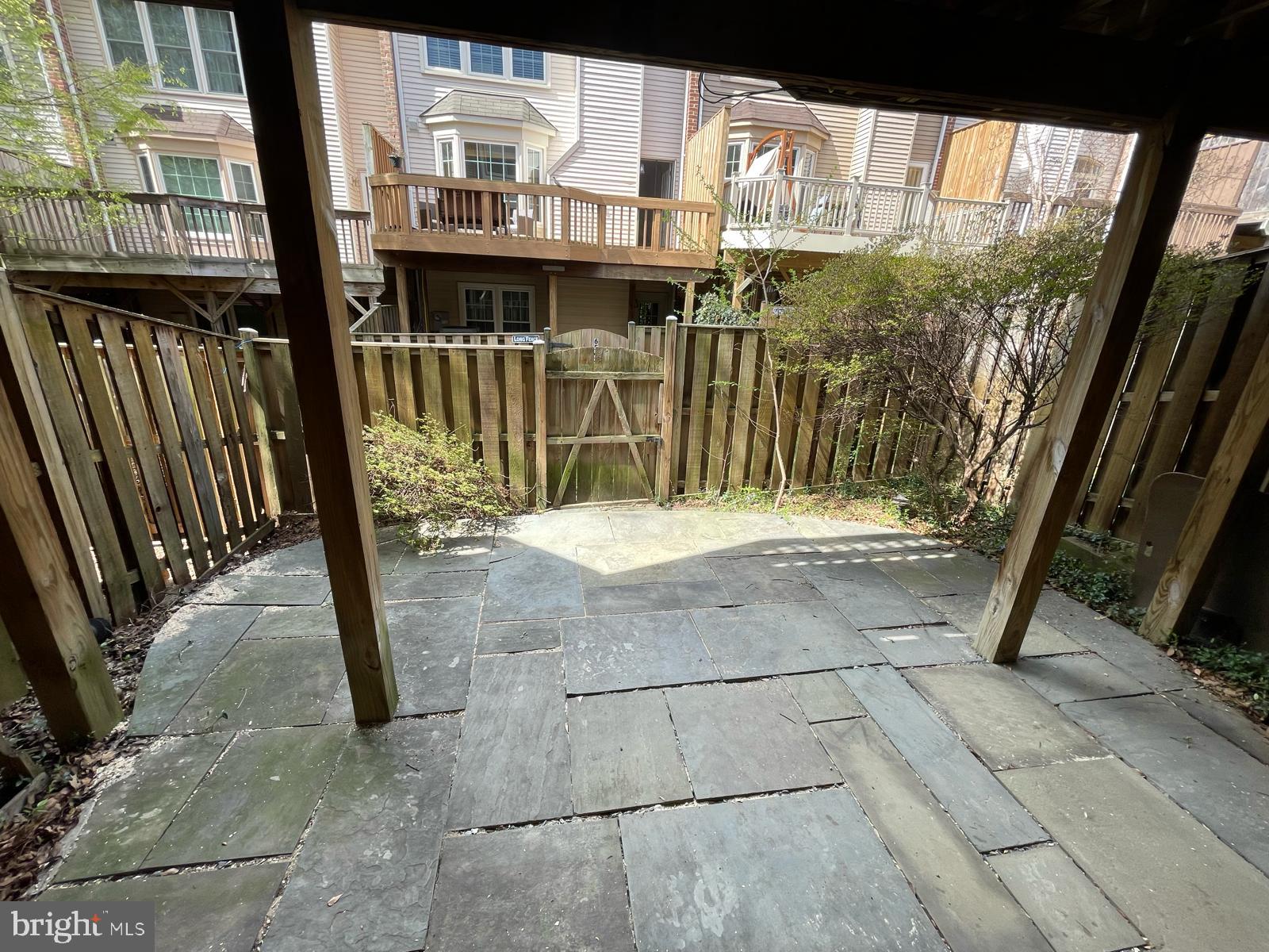6510 Serenade Place Springfield, VA 22150 - Photo 15 of 29 a view of a porch with a floor to ceiling window
