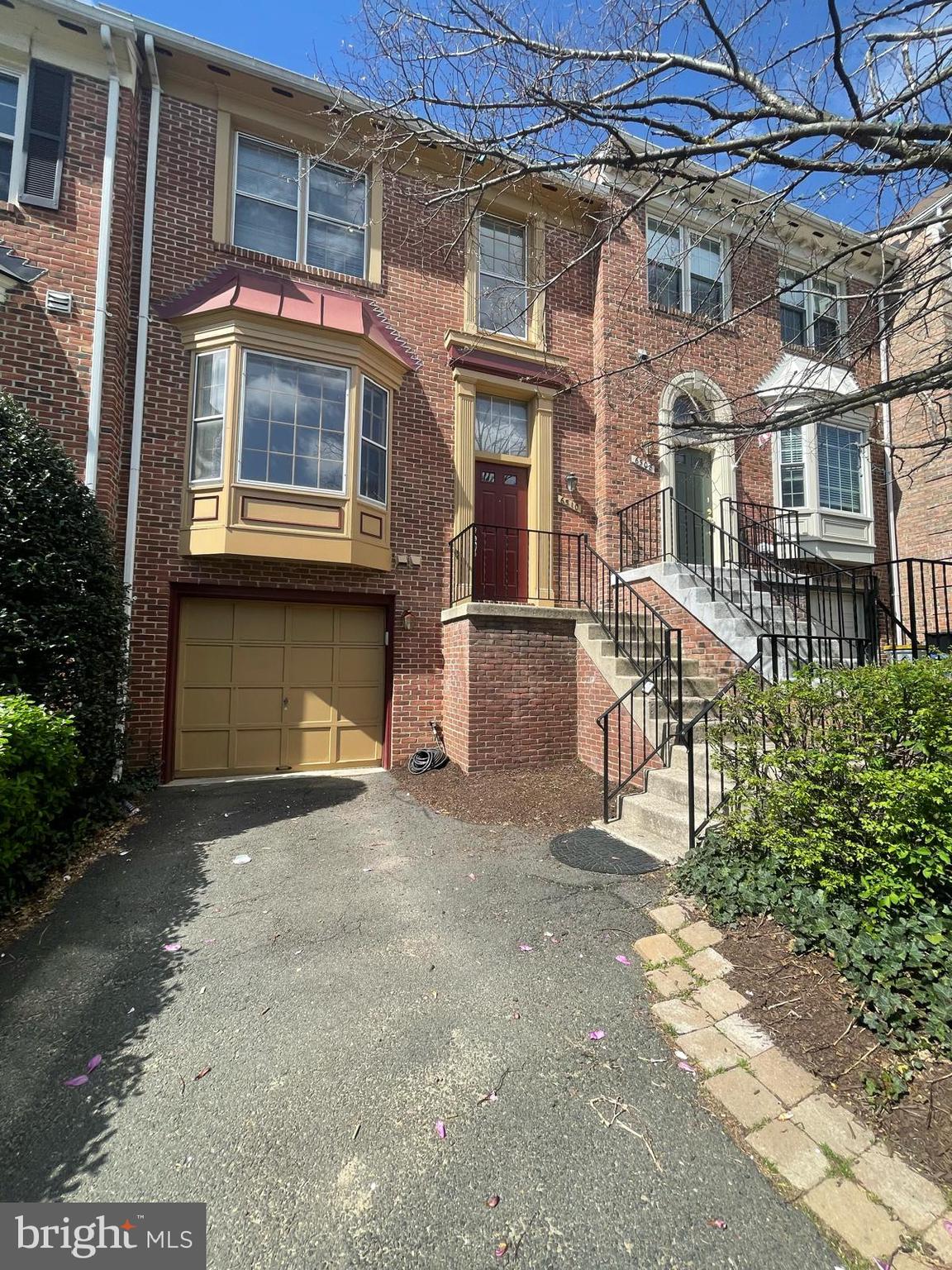 6510 Serenade Place Springfield, VA 22150 - Photo 2 of 29 a view of a brick building with many windows