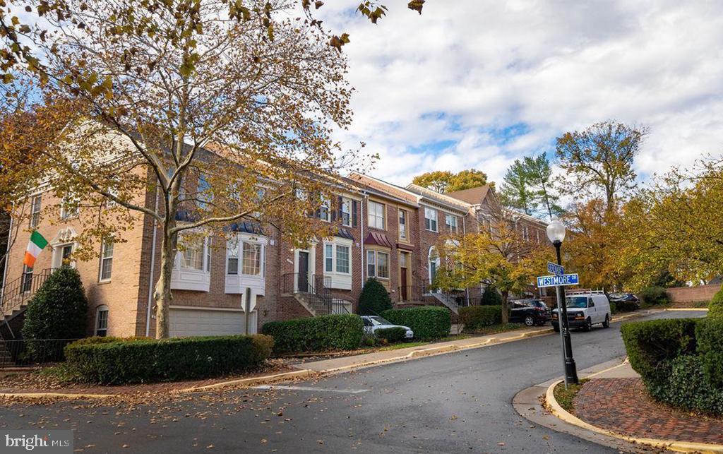 6510 Serenade Place Springfield, VA 22150 - Photo 29 of 29 a front view of a house with a yard and fountain