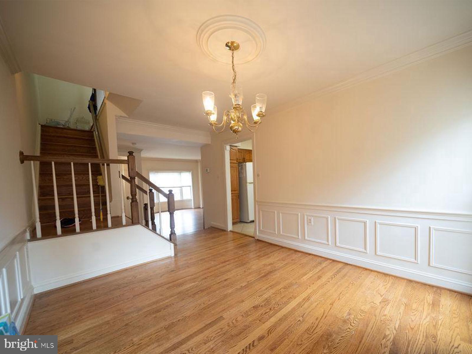 6510 Serenade Place Springfield, VA 22150 - Photo 7 of 29 a view of a livingroom with wooden floor