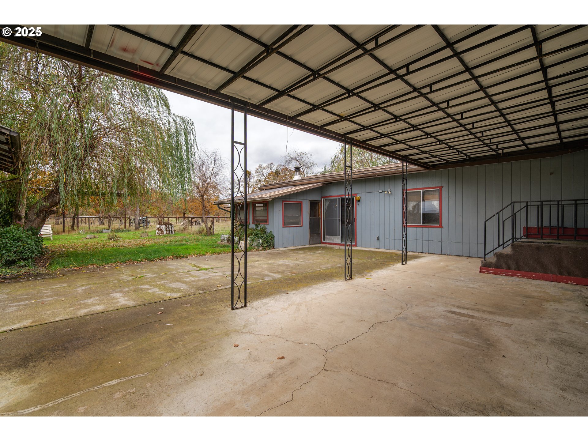 5209 Beagle Road White City, OR 97503 - Photo 30 of 48 a view of a house with backyard and a tree