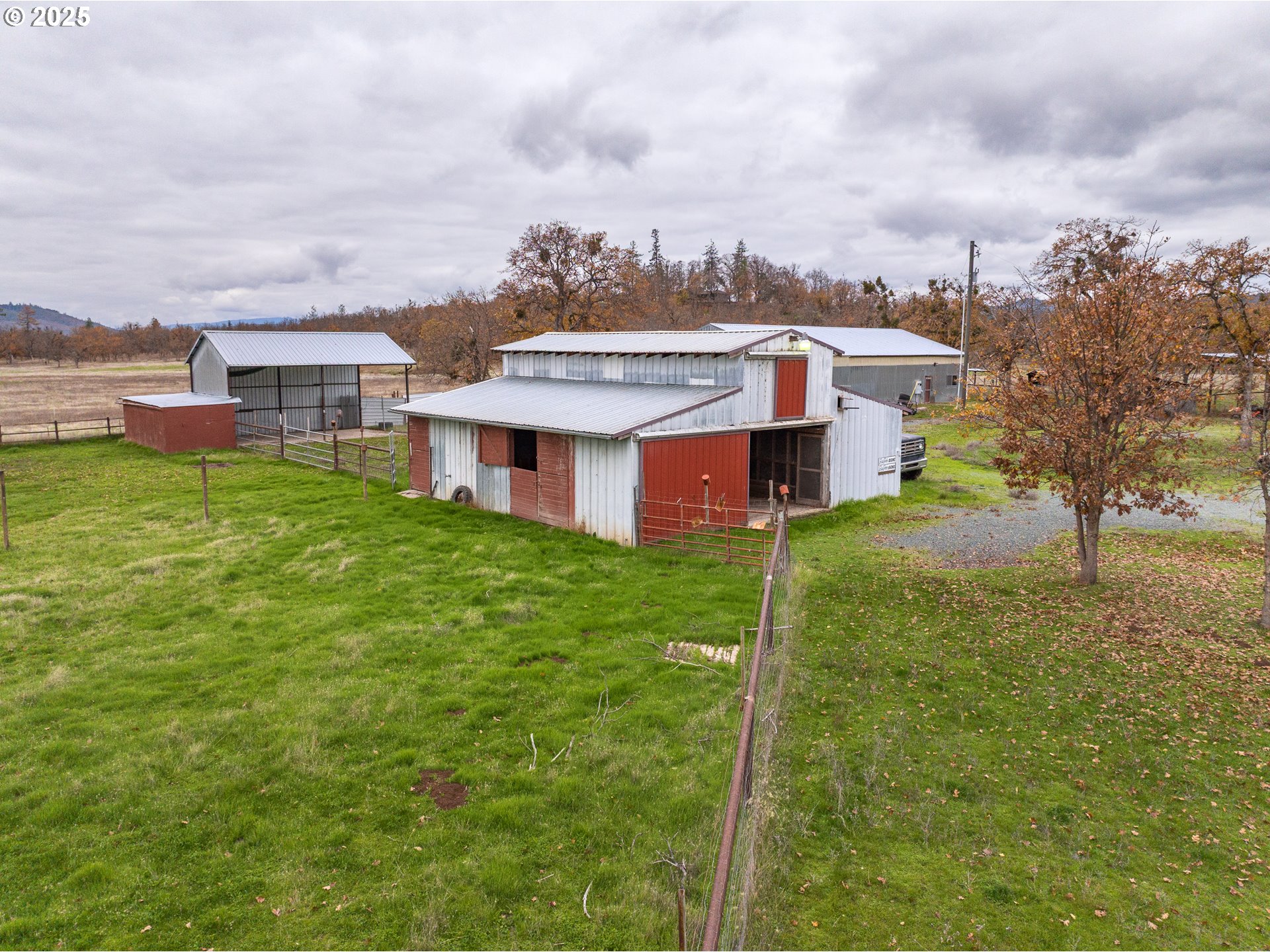 5209 Beagle Road White City, OR 97503 - Photo 39 of 48 a aerial view of a house with a yard and a fountain