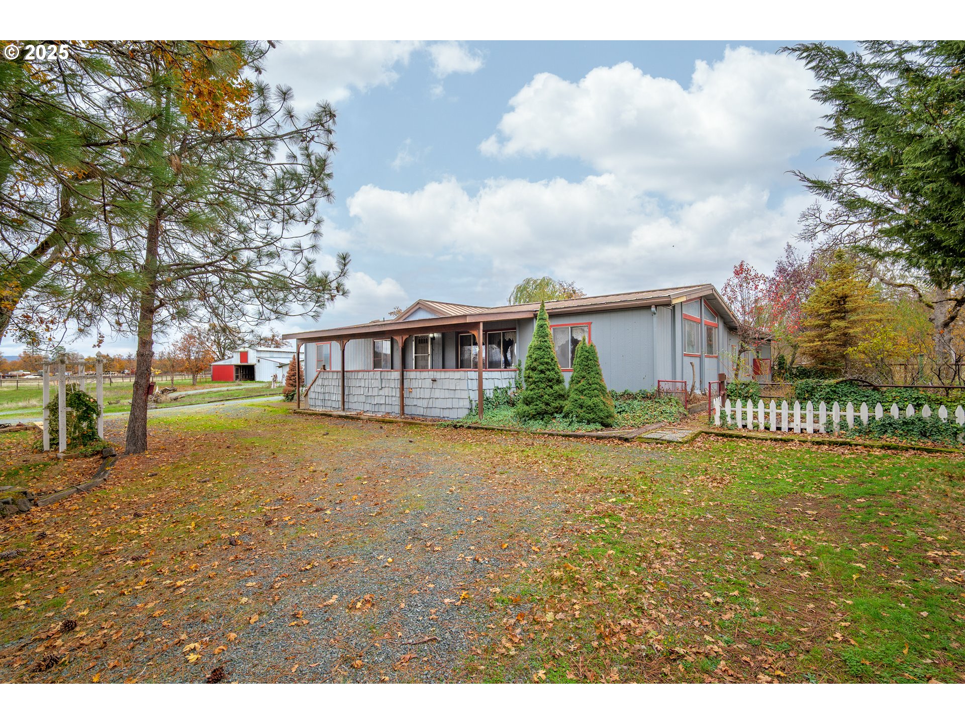 5209 Beagle Road White City, OR 97503 - Photo 48 of 48 a front view of a house with a yard and lake view