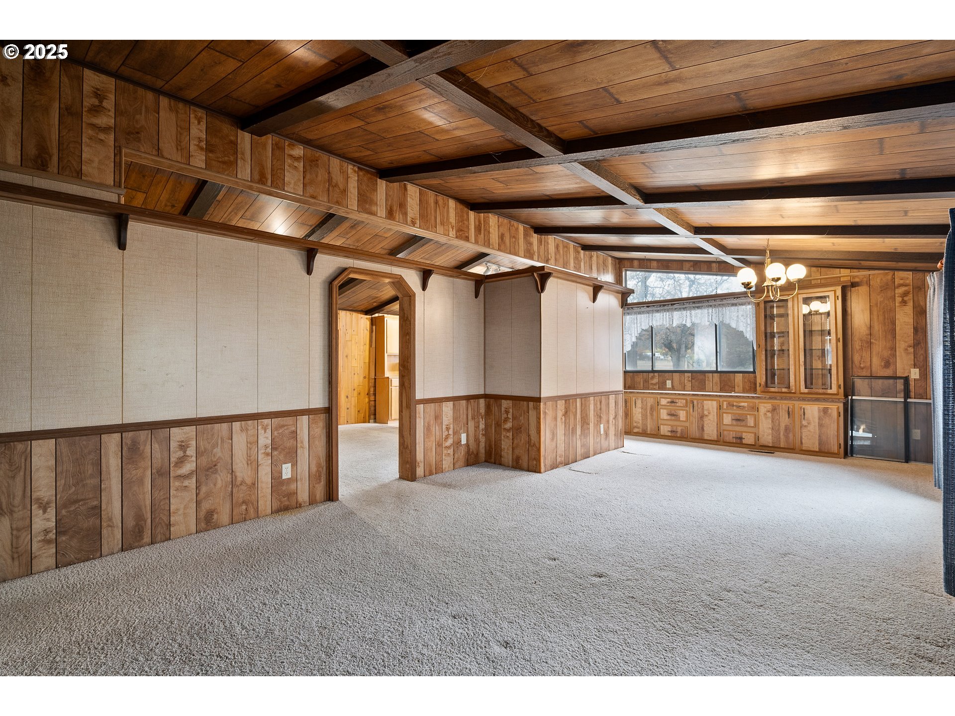 5209 Beagle Road White City, OR 97503 - Photo 6 of 48 a view of an empty room with a couch