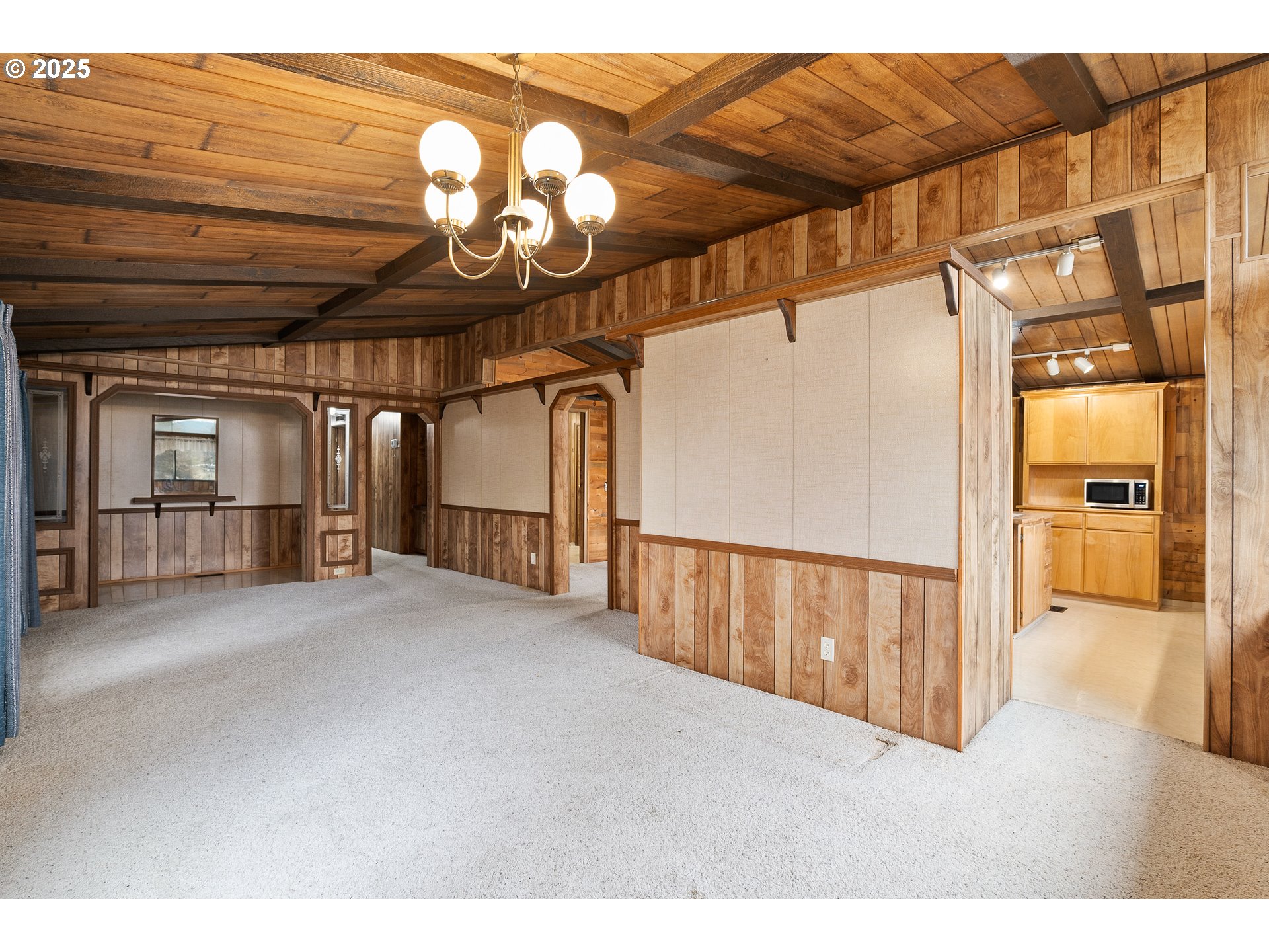 5209 Beagle Road White City, OR 97503 - Photo 8 of 48 a view of an empty room with a fireplace