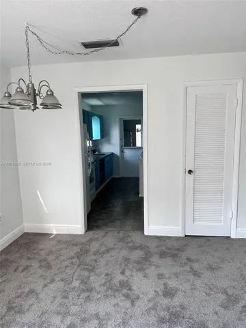 a view of a room with a hanging space