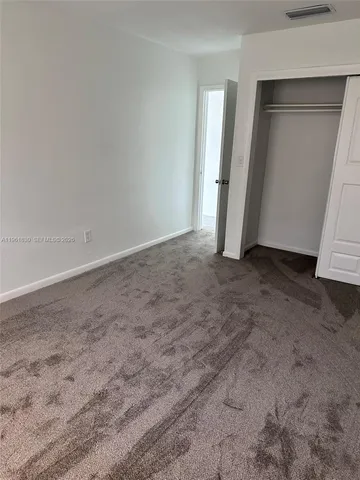 an empty room with closet