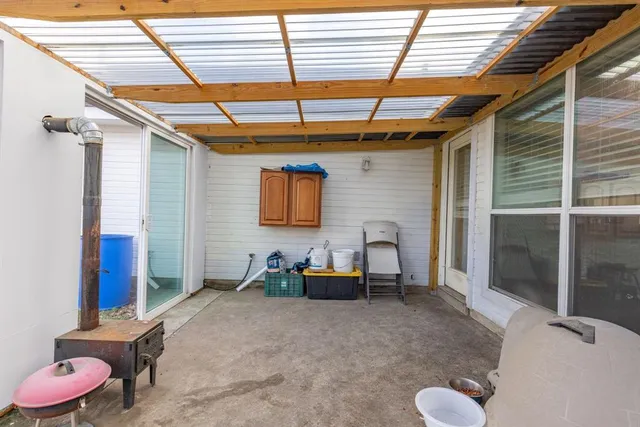 a view of living room filled with furniture